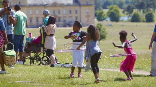 children playing with hula-hoops at Croome park Worcestershire